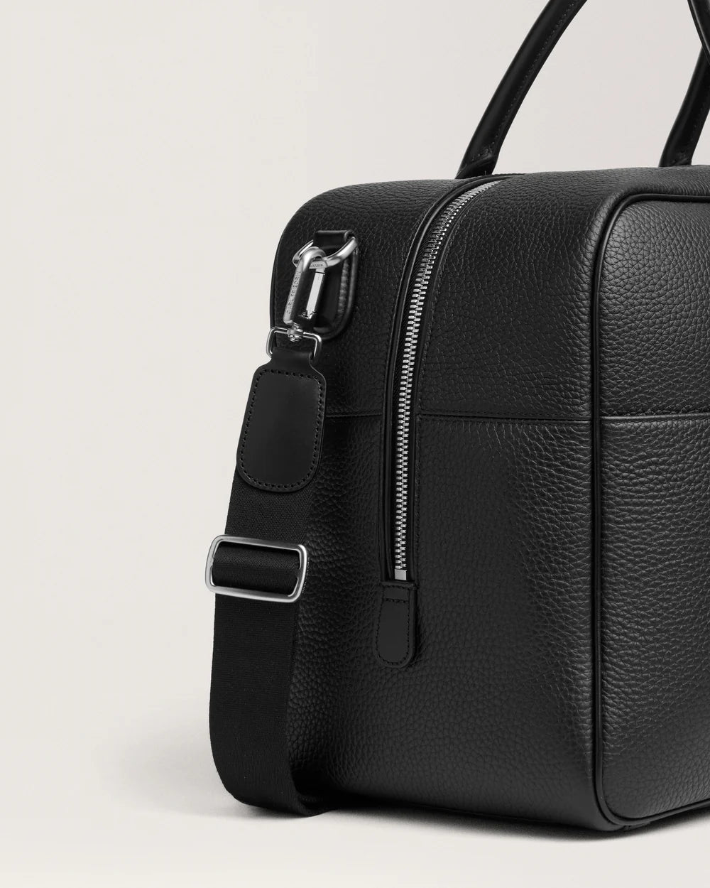 Sac voyage cuir - détail bandoulière et fermeture