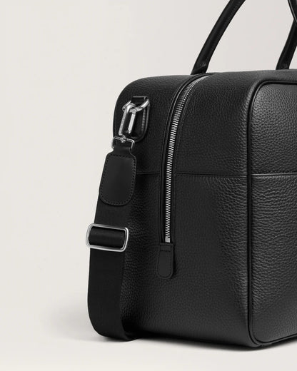 Sac voyage cuir - détail bandoulière et fermeture