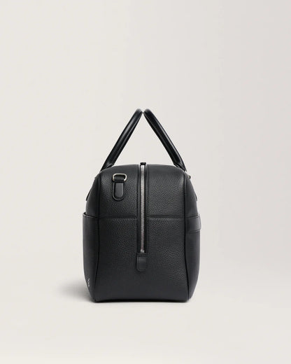Sac voyage cuir sur valise trolley